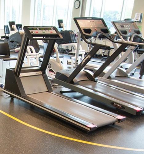 A treadmill in an exercise room