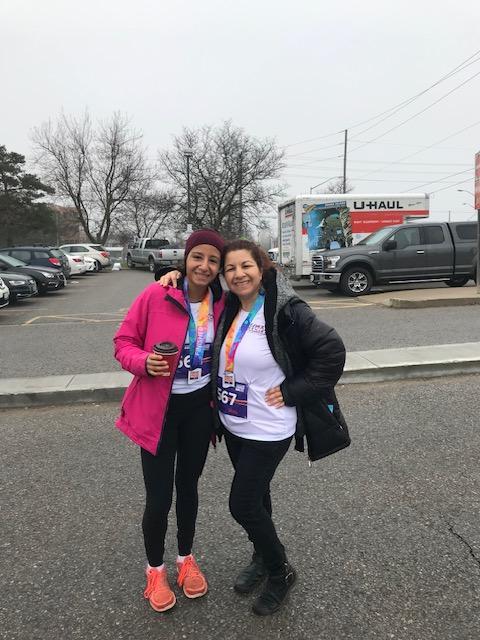 Adele standing with her daughter ready to participate in Strides for Mackenzie Health