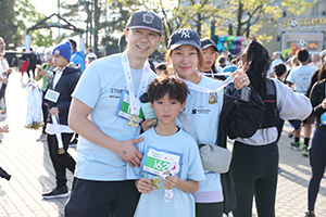 A family enjoys the sunshine after completing their 5K at Canada’s Wonderland in support of Mackenzie Health. 